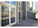 Back deck with large windows and sliding glass door at 4669 Stansbury Ln, Indianapolis, IN 46254