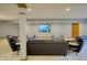 Finished basement with multiple seating areas, a television, and ample space for recreation at 6012 Yellow Birch Ct, Avon, IN 46123