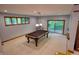 Finished basement features a pool table and access to outside at 6012 Yellow Birch Ct, Avon, IN 46123