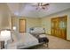 Large, sunny bedroom with seating and two closets at 6012 Yellow Birch Ct, Avon, IN 46123