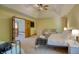 Spacious main bedroom features a ceiling fan, natural light, and an ensuite bathroom at 6012 Yellow Birch Ct, Avon, IN 46123