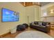 The living room includes a seating area with a large screen television and unique design at 6012 Yellow Birch Ct, Avon, IN 46123