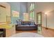 View of a large Gathering room with an accent table, couch, and large picture windows at 6012 Yellow Birch Ct, Avon, IN 46123