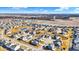 An aerial view of a spacious community, with a pond and a water tower in the background at 6115 Adler Ct, Whitestown, IN 46075