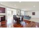 Open concept dining area with hardwood floors, dining table, and natural light at 6115 Adler Ct, Whitestown, IN 46075