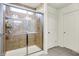 Glass shower with tile surround, shelving and dual shower heads providing a luxurious bathing experience at 6115 Adler Ct, Whitestown, IN 46075