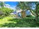 Stone retaining wall and grassy backyard at 635 Terrace Dr, Zionsville, IN 46077