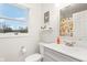 Bright bathroom with gray vanity and shower at 635 Terrace Dr, Zionsville, IN 46077
