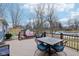 Relaxing deck overlooking a pond with seating for guests at 635 Terrace Dr, Zionsville, IN 46077