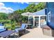 Spacious deck with seating area, overlooking a pond at 635 Terrace Dr, Zionsville, IN 46077
