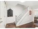 Bright entryway with hardwood floors and staircase at 635 Terrace Dr, Zionsville, IN 46077