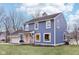 Two-story blue house with attached garage and landscaping at 635 Terrace Dr, Zionsville, IN 46077