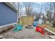 Cozy fire pit area with colorful adirondack chairs at 635 Terrace Dr, Zionsville, IN 46077