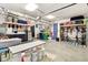 Spacious garage with storage and work area at 635 Terrace Dr, Zionsville, IN 46077