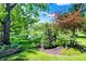 Serene pond view with lush landscaping at 635 Terrace Dr, Zionsville, IN 46077