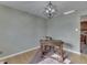 Bright dining room with hardwood floors and view of kitchen at 658 Mellowood Dr, Indianapolis, IN 46217