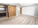 Bedroom with carpet, barn door to bathroom and double closets at 7904 Madden Dr, Fishers, IN 46038