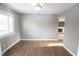 Spacious dining room featuring hardwood floors and access to living room at 7904 Madden Dr, Fishers, IN 46038