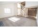 Bright living room with high ceilings and neutral carpeting at 7904 Madden Dr, Fishers, IN 46038