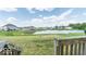 Spacious backyard with pond view and deck access at 8836 Hornady Ct, Indianapolis, IN 46239