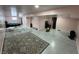 Finished basement with multiple areas and a large carpeted space at 8836 Hornady Ct, Indianapolis, IN 46239