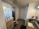 Modern bathroom with a walk-in shower and granite countertops at 8836 Hornady Ct, Indianapolis, IN 46239