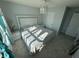 Main bedroom with a king-size bed and stylish decor at 8836 Hornady Ct, Indianapolis, IN 46239