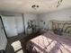 Spacious bedroom with a queen-size bed, dresser and natural light at 8836 Hornady Ct, Indianapolis, IN 46239