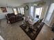 Dining area with table and chairs next to the living room at 8836 Hornady Ct, Indianapolis, IN 46239