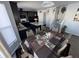 Eat-in kitchen with granite counters and dark cabinets at 8836 Hornady Ct, Indianapolis, IN 46239