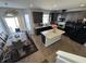 Spacious kitchen with island, stainless steel appliances, and ample cabinet space at 8836 Hornady Ct, Indianapolis, IN 46239