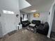 Open living room with hardwood floors and a view of the entry way at 8836 Hornady Ct, Indianapolis, IN 46239