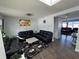 Spacious living room with leather furniture and hardwood floors at 8836 Hornady Ct, Indianapolis, IN 46239