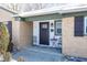 Inviting front entry with dark brown door and small sitting area at 9 Wedding Ln, Plainfield, IN 46168