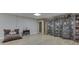 Finished basement with a sauna and seating area at 10402 Shakamak Way, Indianapolis, IN 46239