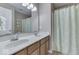 Clean bathroom with double vanity and shower at 10402 Shakamak Way, Indianapolis, IN 46239