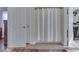 Bathroom with double sinks, mirror, and shower at 10402 Shakamak Way, Indianapolis, IN 46239