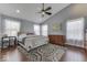 Main bedroom with high ceiling, hardwood floors, and large windows at 10402 Shakamak Way, Indianapolis, IN 46239