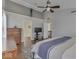 Spacious main bedroom with wood floors and ensuite access at 10402 Shakamak Way, Indianapolis, IN 46239