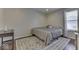 Bedroom with a queen bed and a home office area at 10402 Shakamak Way, Indianapolis, IN 46239
