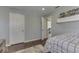 Bedroom with a bed and walk-in closet at 10402 Shakamak Way, Indianapolis, IN 46239