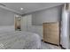 Bedroom with a queen bed, dresser, and hardwood floors at 10402 Shakamak Way, Indianapolis, IN 46239