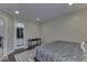 Bedroom with a queen bed and a walk-in closet at 10402 Shakamak Way, Indianapolis, IN 46239