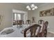 Spacious dining room with view into adjacent living area at 10402 Shakamak Way, Indianapolis, IN 46239