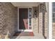 Exterior view of home's dark brown front door at 10402 Shakamak Way, Indianapolis, IN 46239