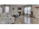 Spacious living room with a comfortable sectional sofa and fireplace at 10402 Shakamak Way, Indianapolis, IN 46239