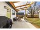 Inviting backyard patio with outdoor furniture and string lights, perfect for entertaining at 1102 N Newman St, Indianapolis, IN 46201