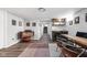 Finished basement with a bar, vinyl record storage, and space for entertaining at 1102 N Newman St, Indianapolis, IN 46201