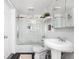 Cozy bathroom featuring white subway tiles in shower and updated sink at 1102 N Newman St, Indianapolis, IN 46201