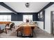 Inviting dining room with a wooden table, stylish chairs, and modern decor at 1102 N Newman St, Indianapolis, IN 46201